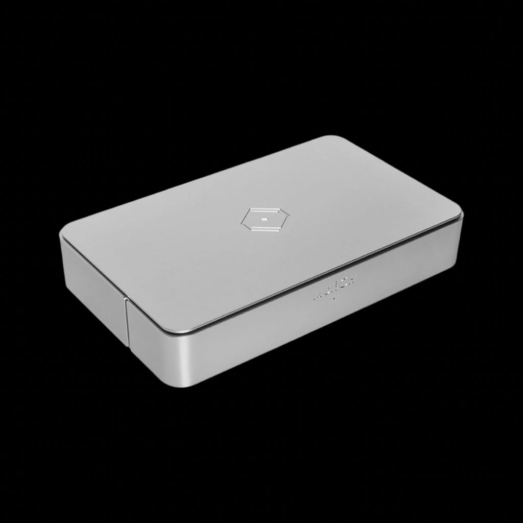 Top angle view of silver Munich MU audiophile-grade hifi music streamer showcasing sleek and modern design